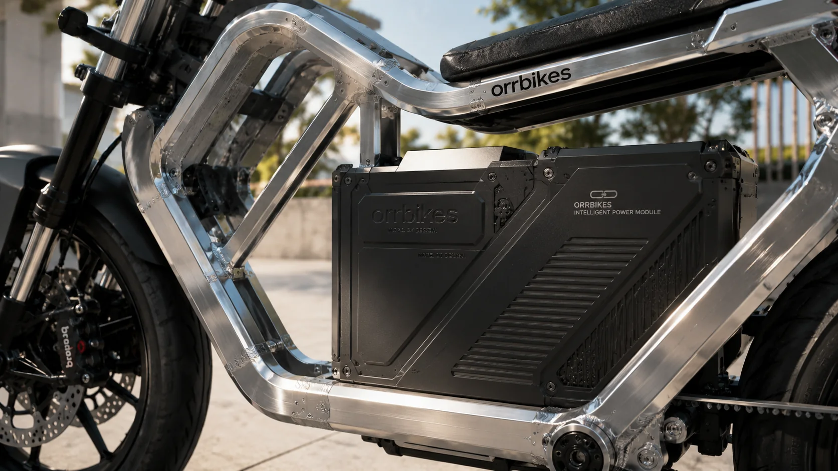 Close-up of the ORRBIKES battery module held inside the silver frame